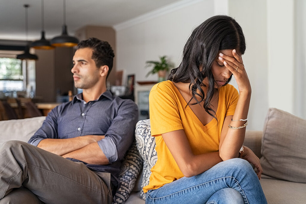 Woman and man on couch