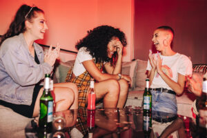 Friends laughing at a party